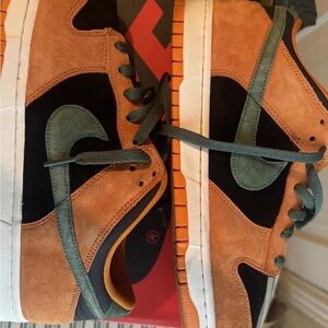 Nike Men's Orange and Black Sneakers with Green Accents